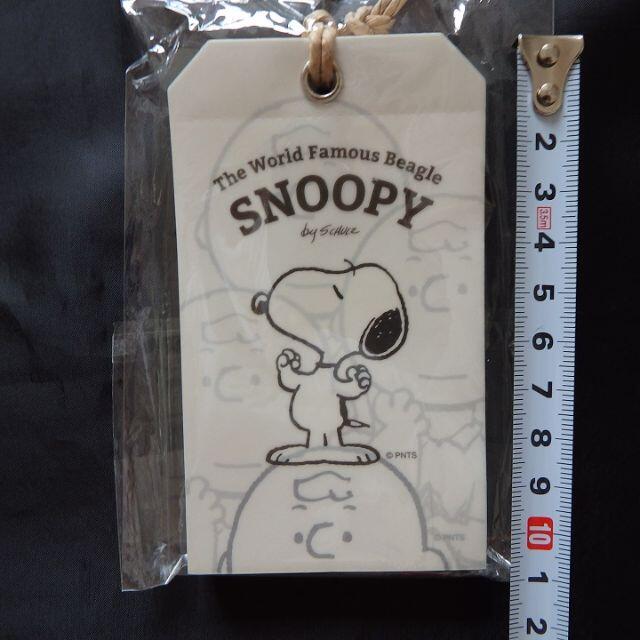 SNOOPY(スヌーピー)の【未開封品】SNOOPY　ひも付きメモ（Lサイズとレギュラーサイズ） インテリア/住まい/日用品の文房具(ノート/メモ帳/ふせん)の商品写真