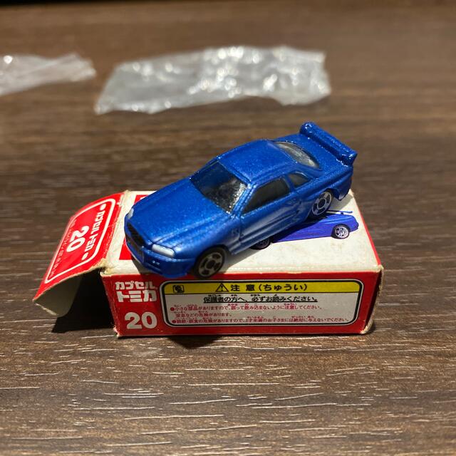 TOMMY(トミー)のカプセルトミカ 日産スカイラインGT-R(R-34) 青色 エンタメ/ホビーのおもちゃ/ぬいぐるみ(ミニカー)の商品写真