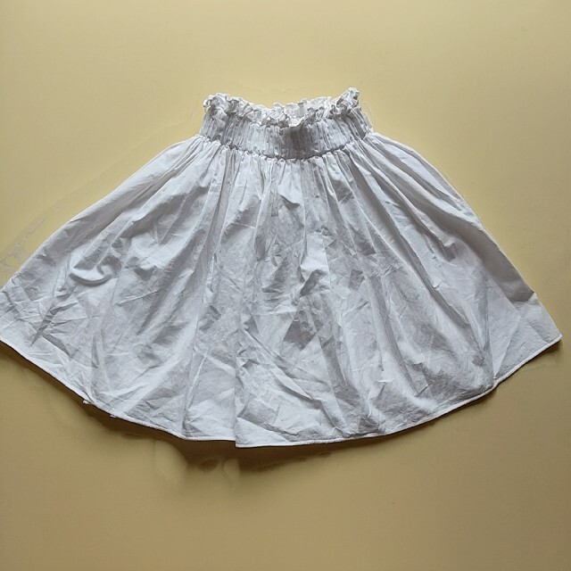 evelyn(エブリン)のeveryn 白 フレアー ミニスカート 綿 リボン レディースのスカート(ミニスカート)の商品写真