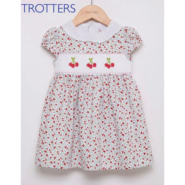 PETIT BATEAU(プチバトー)の新品　英国王室御用達　トロッターズ  TROTTERS  チェリー柄ワンピース キッズ/ベビー/マタニティのベビー服(~85cm)(ワンピース)の商品写真