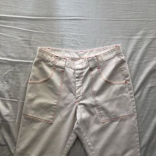 アメリヴィンテージ(Ameri VINTAGE)のwhite flared pants  (ワークパンツ/カーゴパンツ)