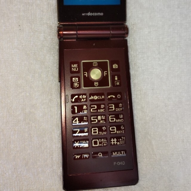 中古　docomo F-04D　ブラウン