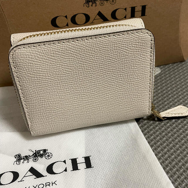 coach 三つ折り財布 1