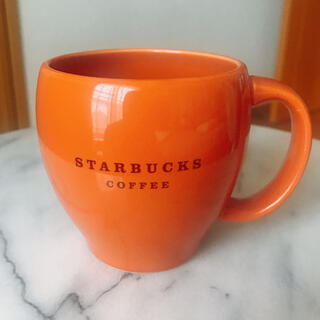 スターバックスコーヒー(Starbucks Coffee)のスターバックス　マグカップ　オレンジ(マグカップ)