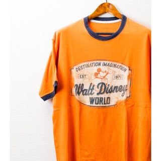 ディズニー(Disney)のWalt　Disney　WORLD オレンジ　Tシャツ(Tシャツ/カットソー(半袖/袖なし))