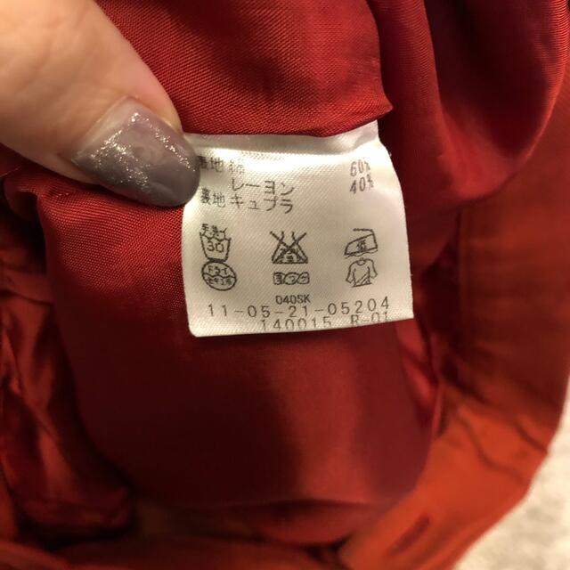 TOMORROWLAND(トゥモローランド)のボールジィ　オレンジ　フロントボタン　スカート レディースのスカート(ひざ丈スカート)の商品写真