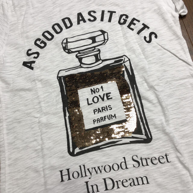 ZARA(ザラ)の【新品】■ナウアイスタイル■パフュームモチーフ Ｔシャツ ゴールド 香水 半袖 レディースのトップス(Tシャツ(半袖/袖なし))の商品写真