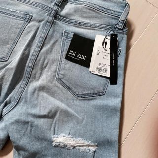 エモダ(EMODA)の新品タグ付き　EMODA フリンジ　denim skinny(デニム/ジーンズ)