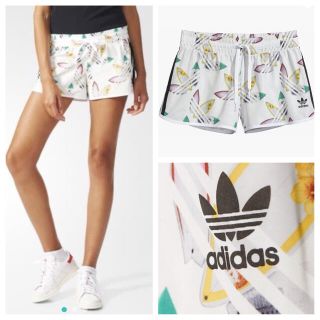 アディダス(adidas)のアディダス×ファレルウィリアムス ショートパンツ/サーフショーツ 花柄  L(ショートパンツ)