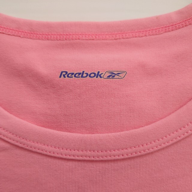 Reebok(リーボック)のリーボック コーラルピンク Tシャツ 新品 スポーツ/アウトドアのトレーニング/エクササイズ(トレーニング用品)の商品写真