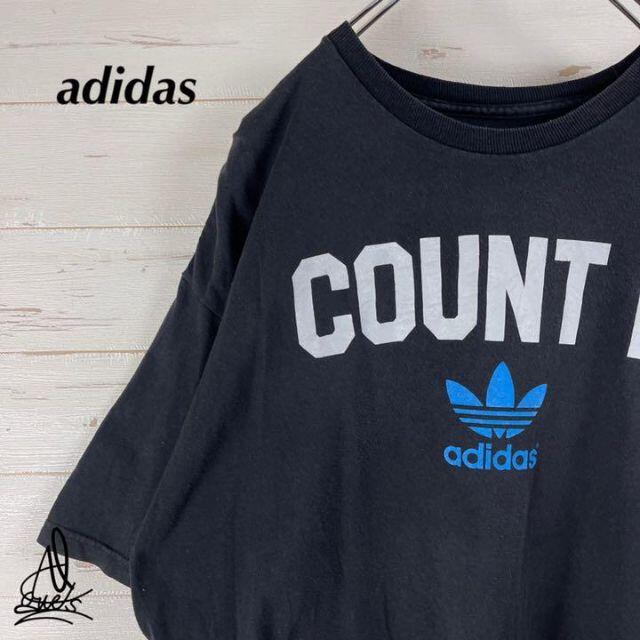 adidas(アディダス)の《デカロゴ》adidas アディダス　Tシャツ　XL☆ブラック　黒　トレフォイル メンズのトップス(Tシャツ/カットソー(半袖/袖なし))の商品写真