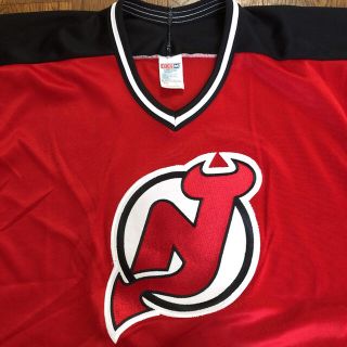 NHL DEVILSチームホッケーシャツ(XL)