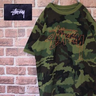 ステューシー(STUSSY)の《ステューシー》迷彩デザイン　ビッグロゴ　M相当　Tシャツ(Tシャツ/カットソー(半袖/袖なし))