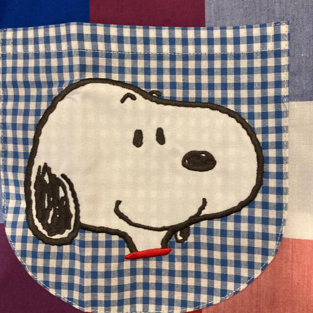 SNOOPY(スヌーピー)のスヌーピー　エプロン　新品 エンタメ/ホビーのおもちゃ/ぬいぐるみ(キャラクターグッズ)の商品写真