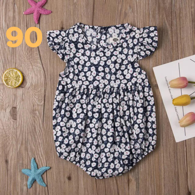 小花柄ベビーロンパース✳︎ ネイビー　90 キッズ/ベビー/マタニティのキッズ服女の子用(90cm~)(ワンピース)の商品写真