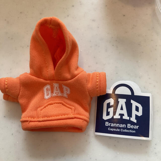 GAP(ギャップ)のGAP ブラナンベア　カプセル　セレクション　パーカー　おれんじ エンタメ/ホビーのおもちゃ/ぬいぐるみ(ぬいぐるみ)の商品写真