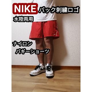 ナイキ(NIKE)のナイキ NIKE ナイロンハーフパンツ バギーショーツ ショートパンツ レッド赤(ショートパンツ)