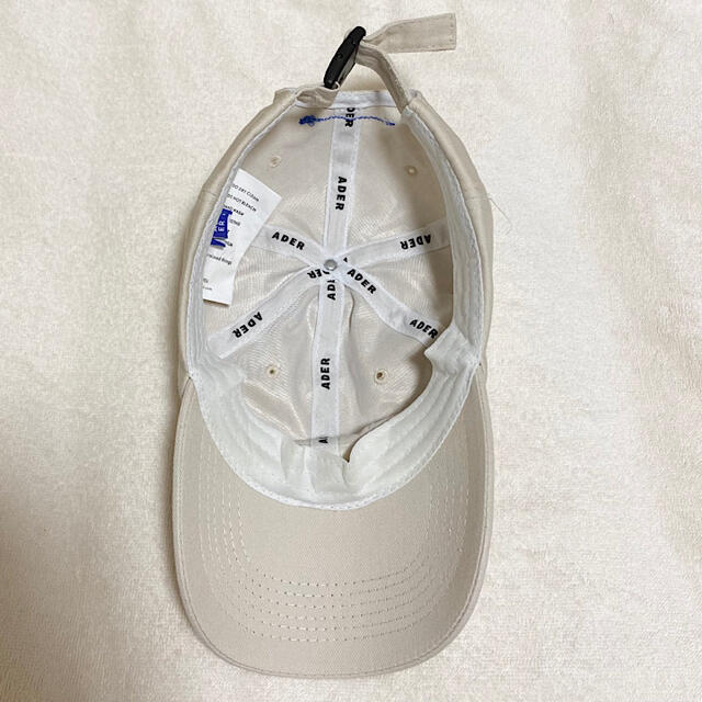 MAISON KITSUNE'(メゾンキツネ)の極美品✨ADER ERROR 2021SS クランプル パッチ キャップ 白 メンズの帽子(キャップ)の商品写真