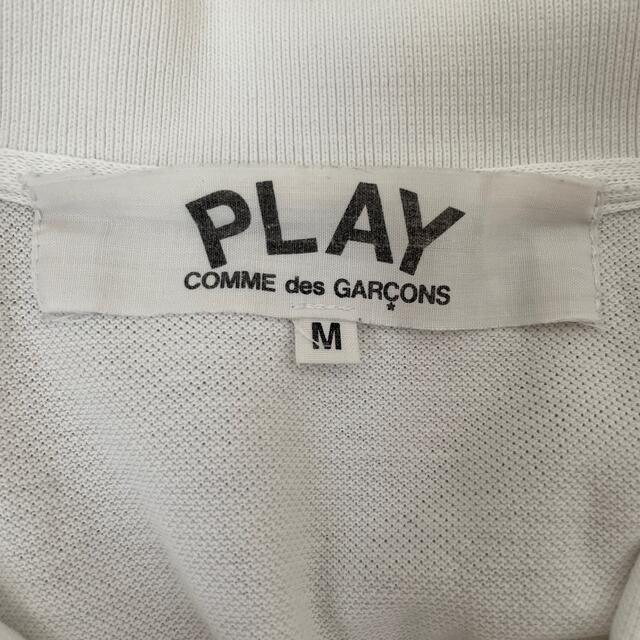 BLACK COMME des GARCONS(ブラックコムデギャルソン)の【まる様専用】playコムデギャルソン　ポロシャツ　赤ハート　ホワイト　　メンズ メンズのトップス(ポロシャツ)の商品写真