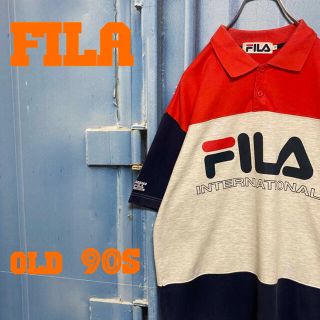 フィラ(FILA)の90s フィラ ポロシャツ ボーダー マルチカラー ゆるだぼ デカロゴ 古着(ポロシャツ)