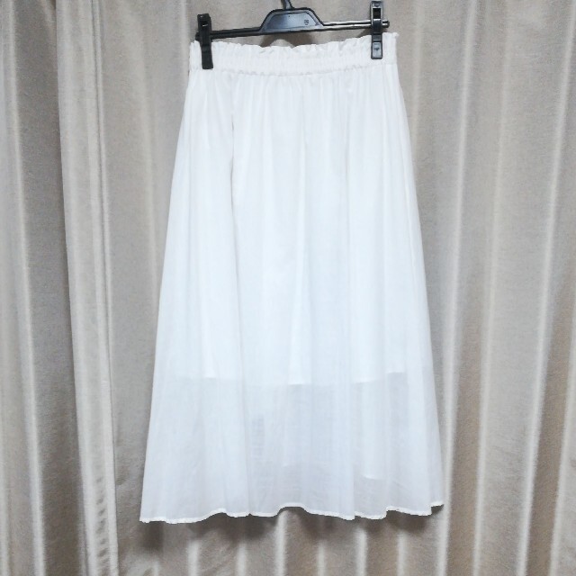 Discoat(ディスコート)のディスコート Discoat アシンメトリーロングフレアスカート　ホワイト  レディースのスカート(ロングスカート)の商品写真