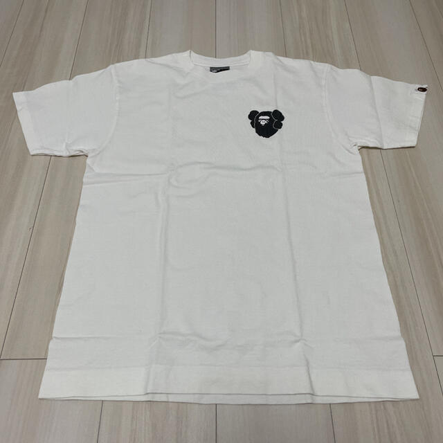 A ‪✕‬ KAWS Tシャツの通販 by YO$HI's shop｜アベイシングエイプならラクマ BATHING APE - BAPE 在庫HOT