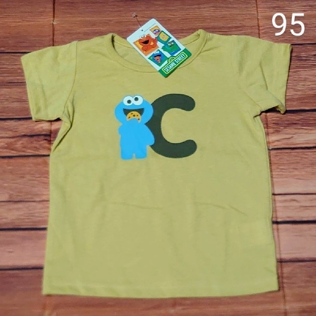 SESAME STREET(セサミストリート)の【新品】セサミストリート　クッキーモンスター半袖Tシャツ95 キッズ/ベビー/マタニティのキッズ服男の子用(90cm~)(Tシャツ/カットソー)の商品写真