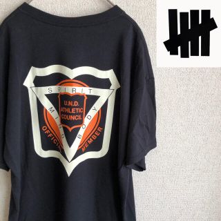 アンディフィーテッド(UNDEFEATED)の新品　UNDEFEATED ビッグロゴ　プリント　半袖　Tシャツ　黒　Lサイズ(Tシャツ/カットソー(半袖/袖なし))