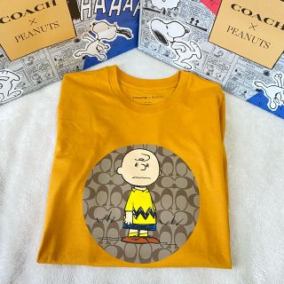 コーチ　スヌーピー　ピーナッツ　チャーリーブラウン　Tシャツ　オレンジ　2021