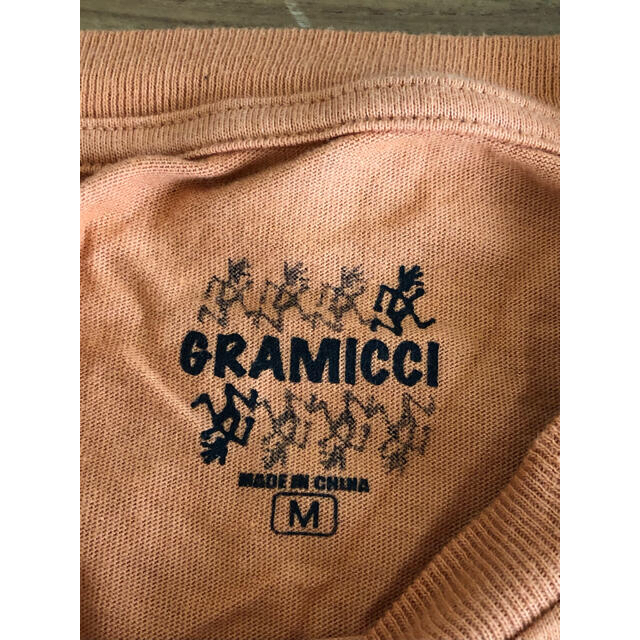 GRAMICCI(グラミチ)のグラミチ 新品 ロンT 長袖 オレンジ ランニングマン メンズ M メンズのトップス(Tシャツ/カットソー(七分/長袖))の商品写真