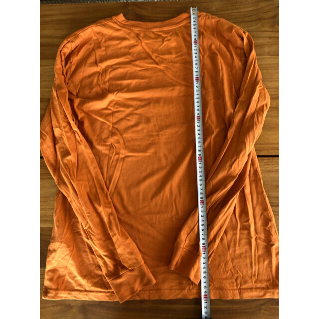 GRAMICCI(グラミチ)のグラミチ 新品 ロンT 長袖 オレンジ ランニングマン メンズ M メンズのトップス(Tシャツ/カットソー(七分/長袖))の商品写真