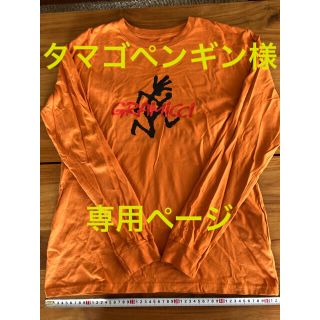 グラミチ(GRAMICCI)のグラミチ 新品 ロンT 長袖 オレンジ ランニングマン メンズ M(Tシャツ/カットソー(七分/長袖))