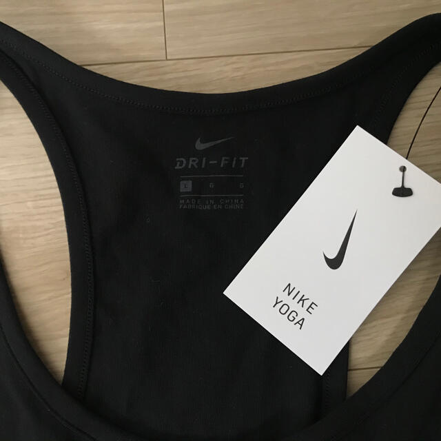 NIKE(ナイキ)のNIKE YOGA DRI-FIT ジャンプスーツ レディースのパンツ(オールインワン)の商品写真