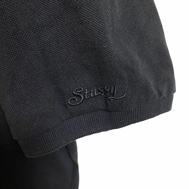 STUSSY(ステューシー)の【廃盤】ステューシー チェッカーフラッグ ジップ ポロシャツ メンズ M 黒 メンズのトップス(ポロシャツ)の商品写真