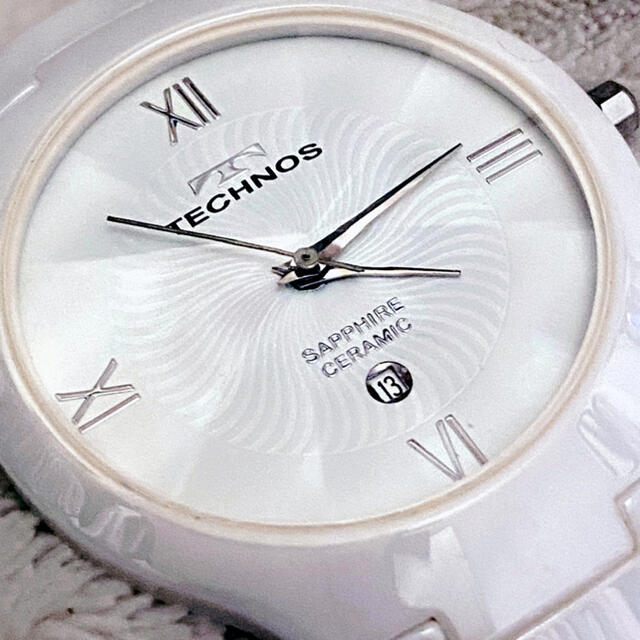 TECHNOS(テクノス)の美品！TECHNOS ホワイト　白 腕時計　セラミック　多面カットフェイス レディースのファッション小物(腕時計)の商品写真