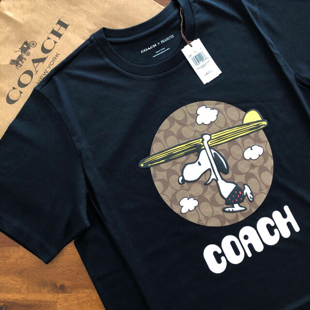 COACH(コーチ)の【COACH X PEANUTS☆新作】新品！Tシャツ、ポーチの2点セットです！ メンズのトップス(Tシャツ/カットソー(半袖/袖なし))の商品写真