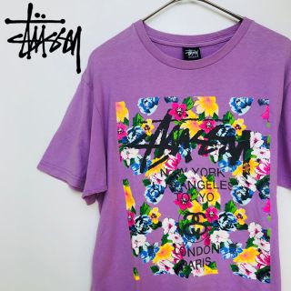 ステューシー(STUSSY)のStussy ステューシー ワールドツアー 花柄 半袖 Tシャツ 紫 Mサイズ(Tシャツ(半袖/袖なし))