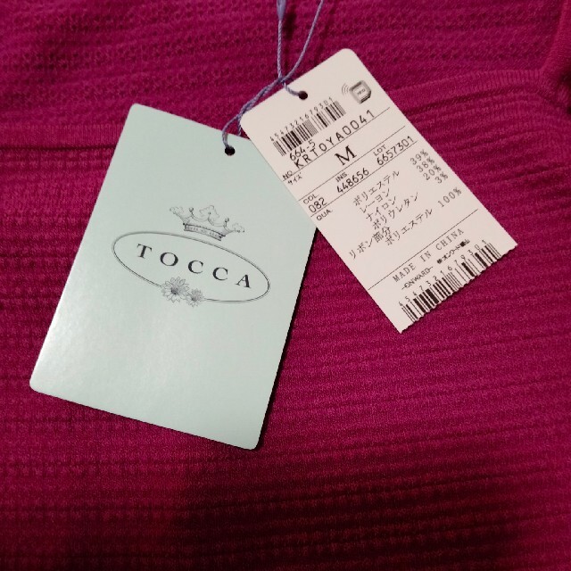 TOCCA(トッカ)のトッカ　TOCCA リボン　トップス　ピンク　フリーサイズ レディースのトップス(カットソー(半袖/袖なし))の商品写真