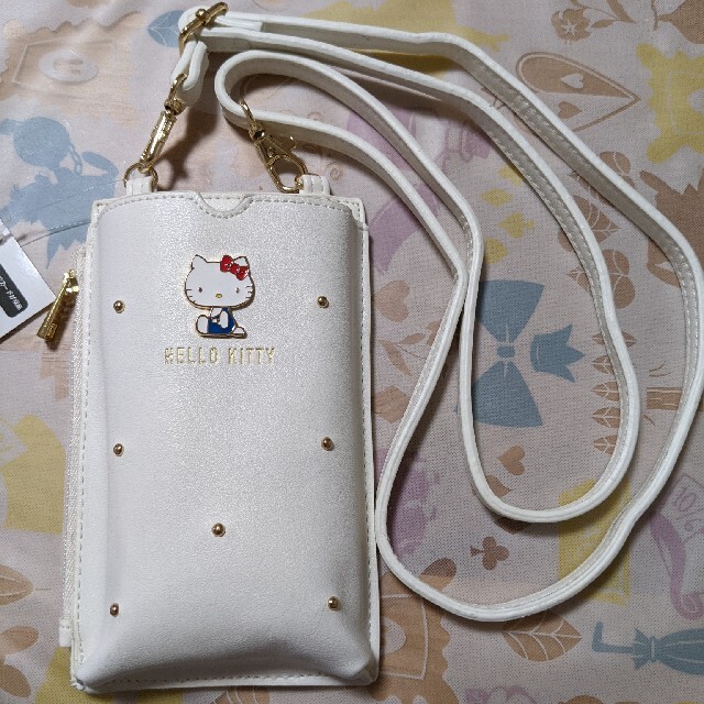 サンリオ - ラスト1点 ハローキティ 薄型スマートフォンポシェット ホワイトの通販 by さくら|サンリオならラクマ