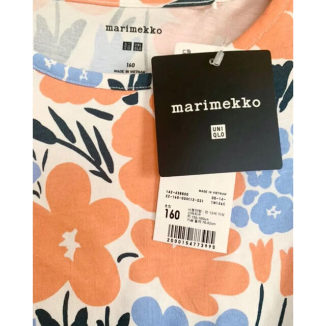 marimekko(マリメッコ)の日本未発売★marimekko uniqlo キッズワンピース　花柄　オレンジ キッズ/ベビー/マタニティのキッズ服女の子用(90cm~)(ワンピース)の商品写真