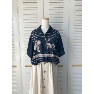 サンタモニカ(Santa Monica)の古着　ヴィンテージ   総柄シャツ　ポリシャツ  レトロ  ビンテージ(シャツ/ブラウス(半袖/袖なし))