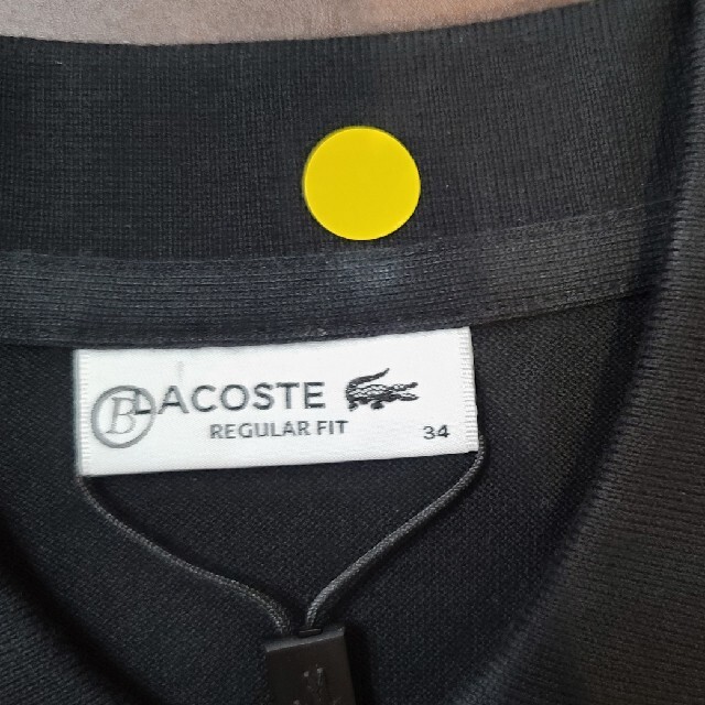 LACOSTE(ラコステ)のLACOSTE　34　ポロシャツ　B品 レディースのトップス(ポロシャツ)の商品写真