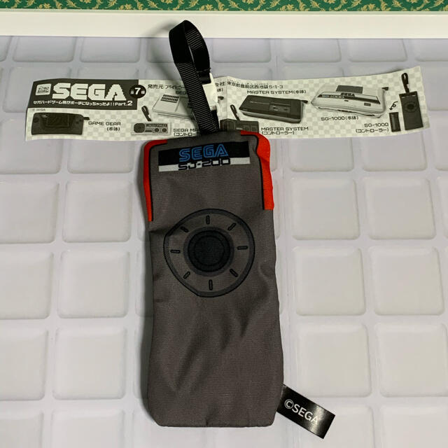 SEGA(セガ)の【匿名配送】セガハードゲーム機ポーチ SG-1000(コントローラー) エンタメ/ホビーのおもちゃ/ぬいぐるみ(キャラクターグッズ)の商品写真