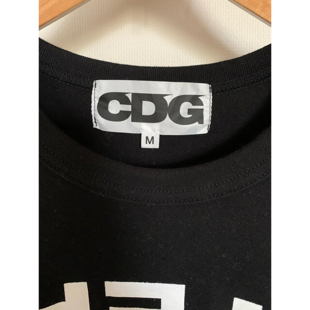 COMME des GARCONS(コムデギャルソン)のCDG marunouchiOPEN記念 CDG × STUSSYコラボTシャツ メンズのトップス(Tシャツ/カットソー(半袖/袖なし))の商品写真