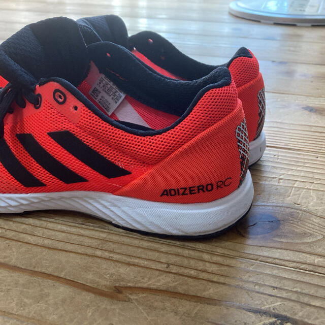 adidas(アディダス)のadidas  adizero rc 27.0cm オレンジ スポーツ/アウトドアのランニング(シューズ)の商品写真