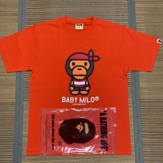 アベイシングエイプ(A BATHING APE)のAPE BAPE KAWS BABY MILO tシャツ tee L オレンジ(Tシャツ/カットソー(半袖/袖なし))