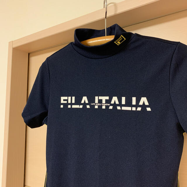 FILA(フィラ)の新品未使用タグ付き☆フィラゴルフモックシャツ　Mサイズ スポーツ/アウトドアのゴルフ(ウエア)の商品写真