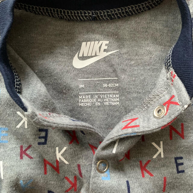 NIKE(ナイキ)のNike ナイキ ロンパース 3ヶ月用 灰色 キッズ/ベビー/マタニティのベビー服(~85cm)(ロンパース)の商品写真