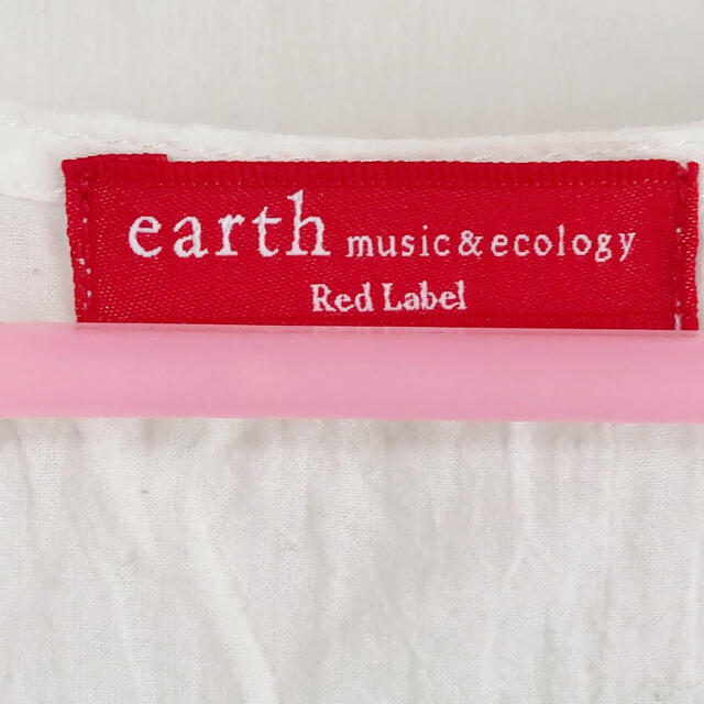 earth music & ecology(アースミュージックアンドエコロジー)の白ティアードチュニックプルオーバー  レディースのトップス(チュニック)の商品写真