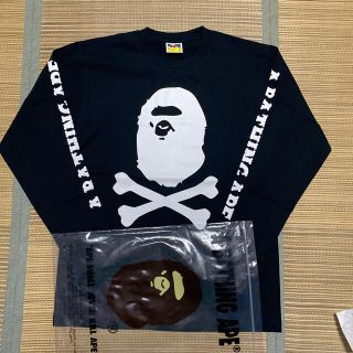 アベイシングエイプ(A BATHING APE)のAPE BAPE PIRATE STORE KAWS ロンt tシャツ L 黒(Tシャツ/カットソー(七分/長袖))